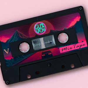 Old audio tape cassette on a pink background. Top view, old technology concept